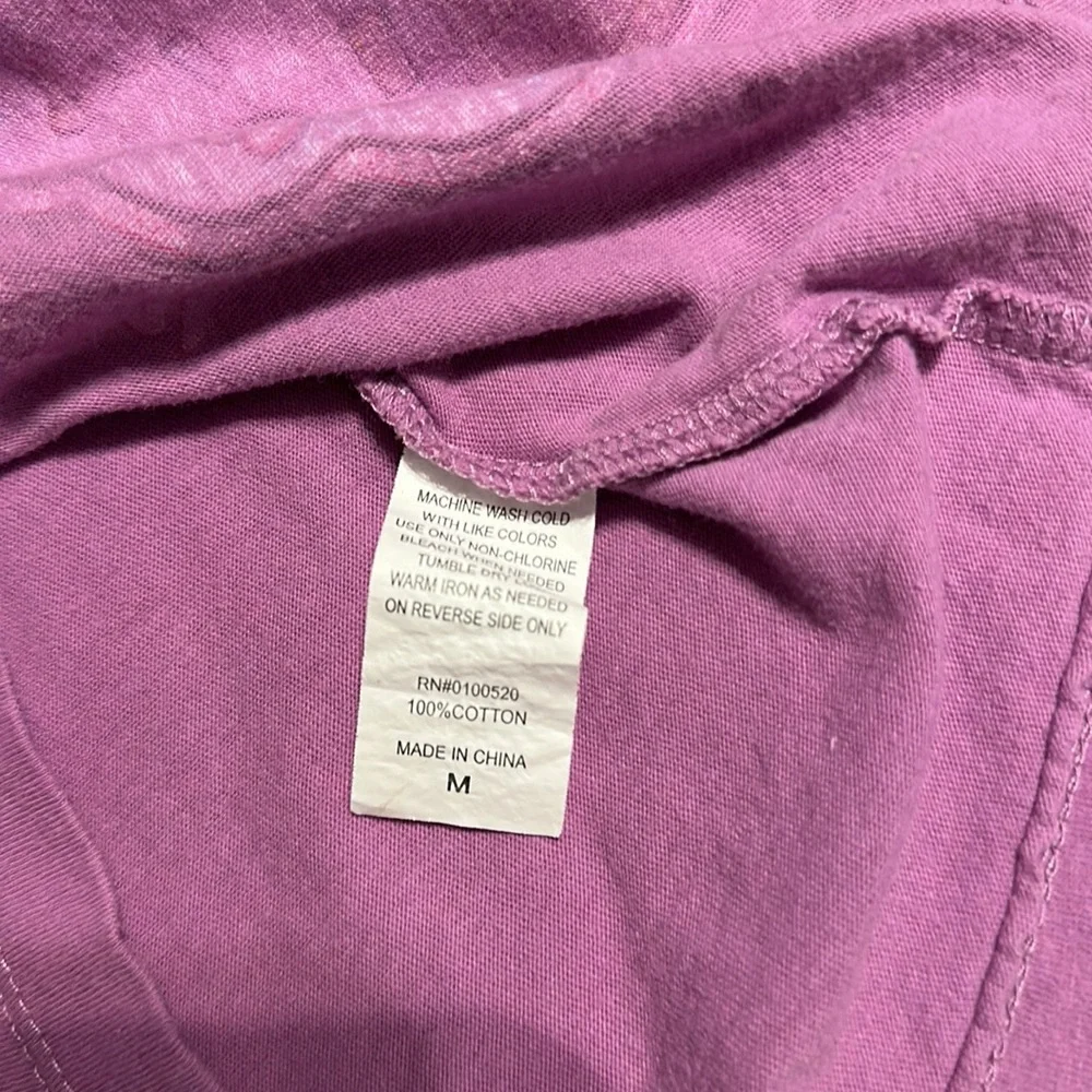 2 tee shirts and pair of shorts shirts are size girls medium. Puma and peanuts. - Picture 7 of 11